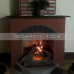 Takdah villa family room fireplace